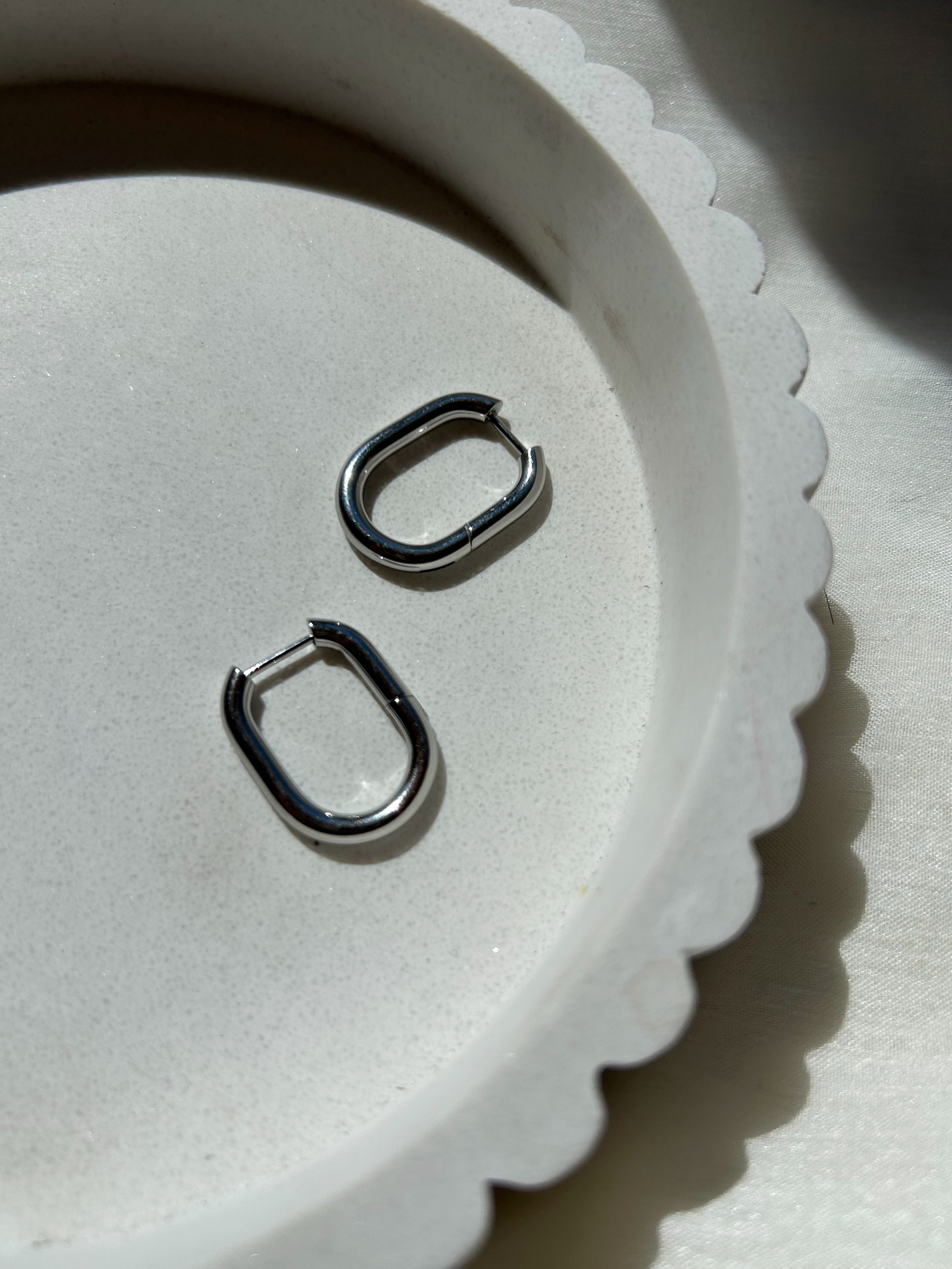 Aretes U plata